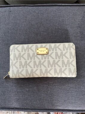 Michael Kors Cream/Beige MK Signature Zip Wallet with Gold Plaque